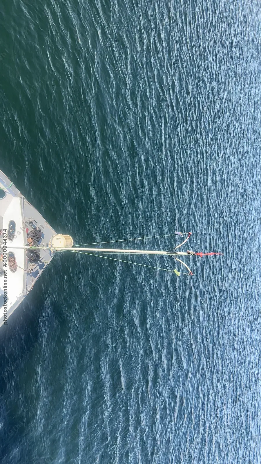 Aswan, Egypt - Feb 8, 2025: Footage from the deck of a cruise ship on the Nile River, panning across the waters with distant shores of Aswan and other ships.