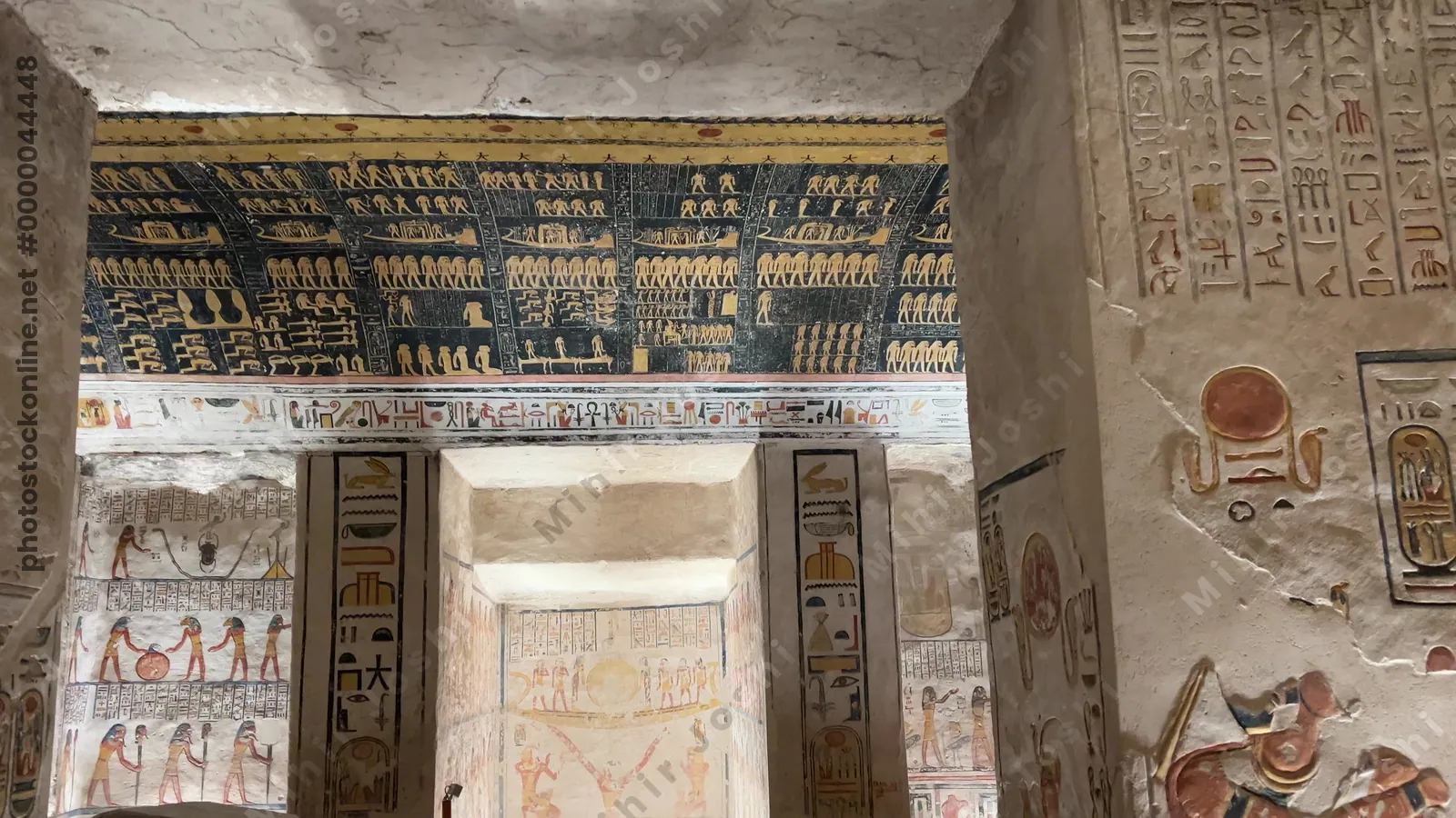 Luxor, Egypt - Feb 11, 2025: Burial chamber of the Tomb of Ramesses VI (KV9) showing decorated walls, painted ceiling, and broken sarcophagus in the Valley of the Kings.