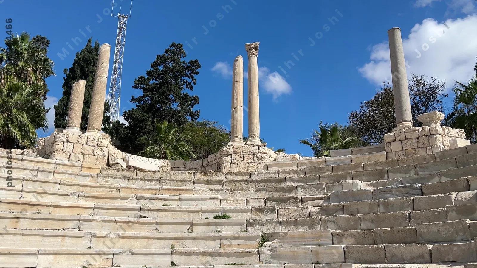 Alexandria, Egypt - Feb 13, 2025: Roman theatre ruins with preserved stone seating and columns at the Kom El-Dikka archaeological site in the city center.