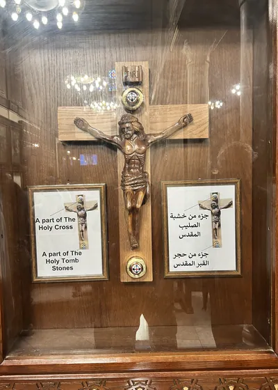 Cairo, Egypt -  Feb 5, 2025: Relics of the Holy Cross and tombstone in Saints Sergius and Bacchus Church (Abu Serga), a historic Coptic site in Old Cairo, Egypt
