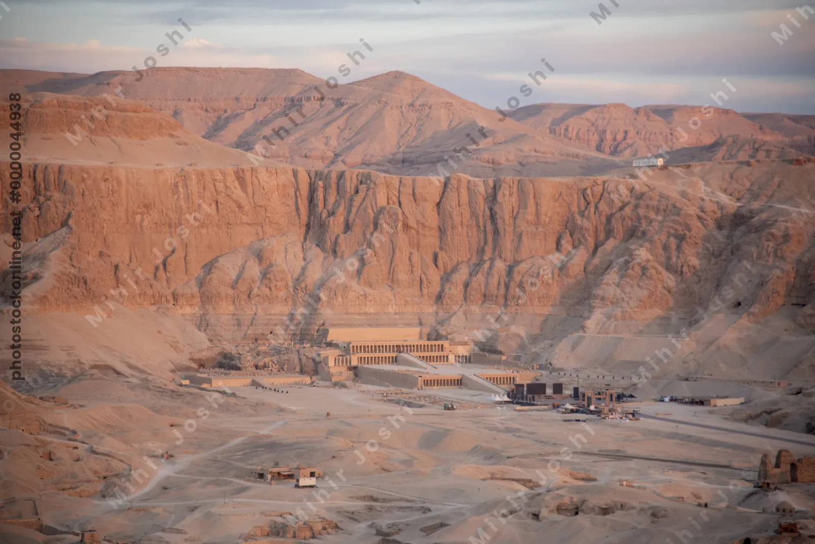 Luxor, Egypt - Feb 10, 2025: Temple of Hatshepsut bathed in early morning sunlight, seen during a hot air balloon ride over Luxor, Egypt