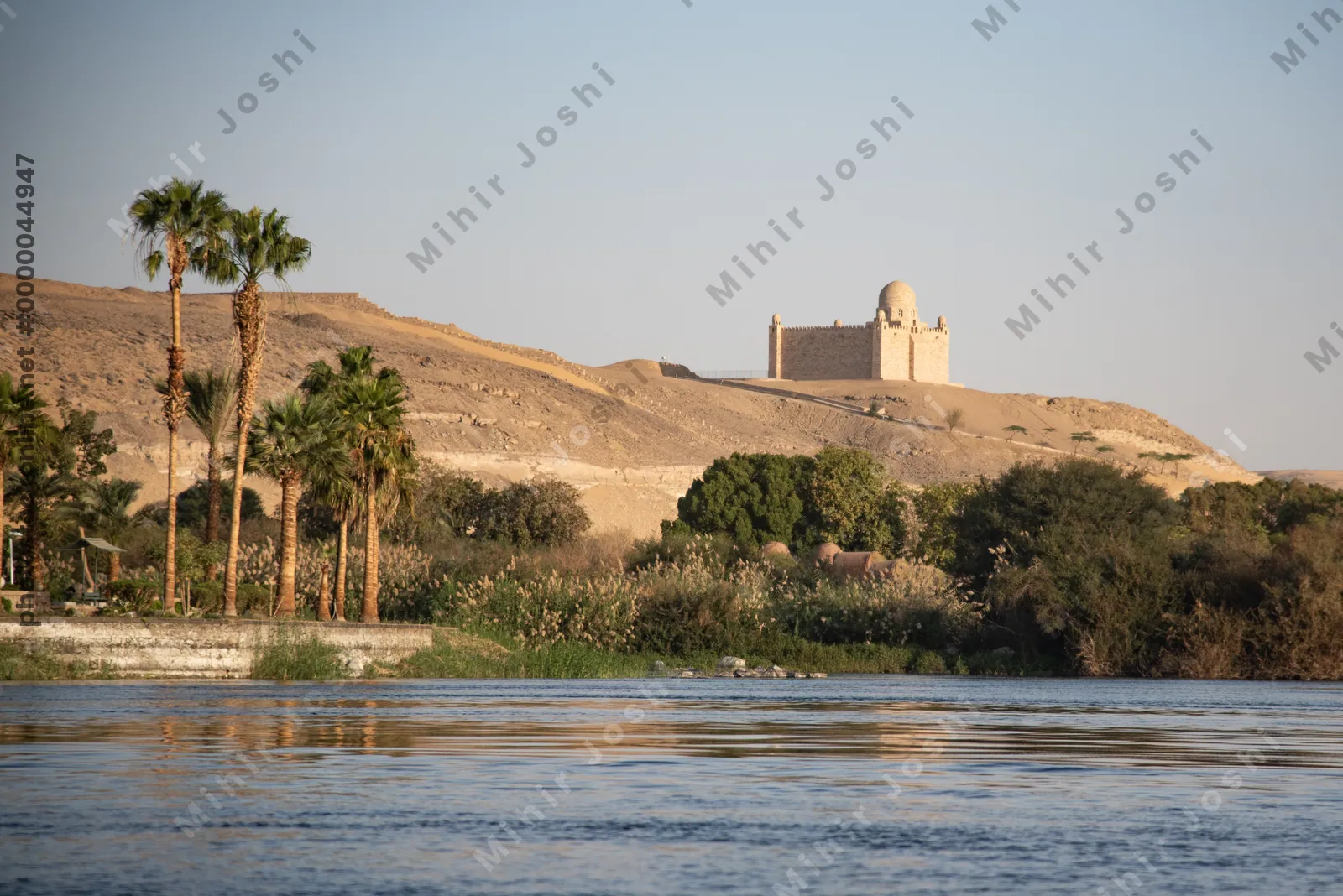 Aswan, Egypt - Feb 7, 2025:  Mausoleum of Aga Khan overlooking the Nile and desert landscape near Aswan, Egypt.