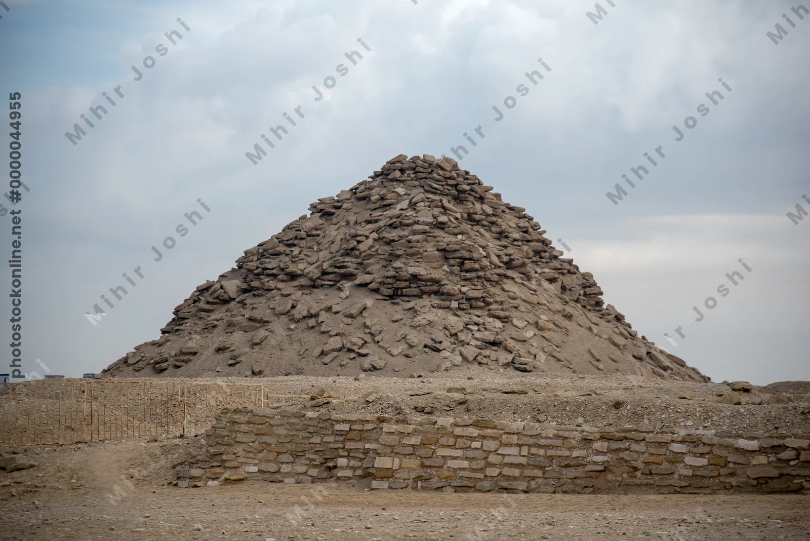 Saqqara, Egypt - Feb 5, 2024: The ruins of the Pyramid of Userkaf, a Fifth Dynasty pharaoh, located in the Saqqara necropolis near Cairo, Egypt.